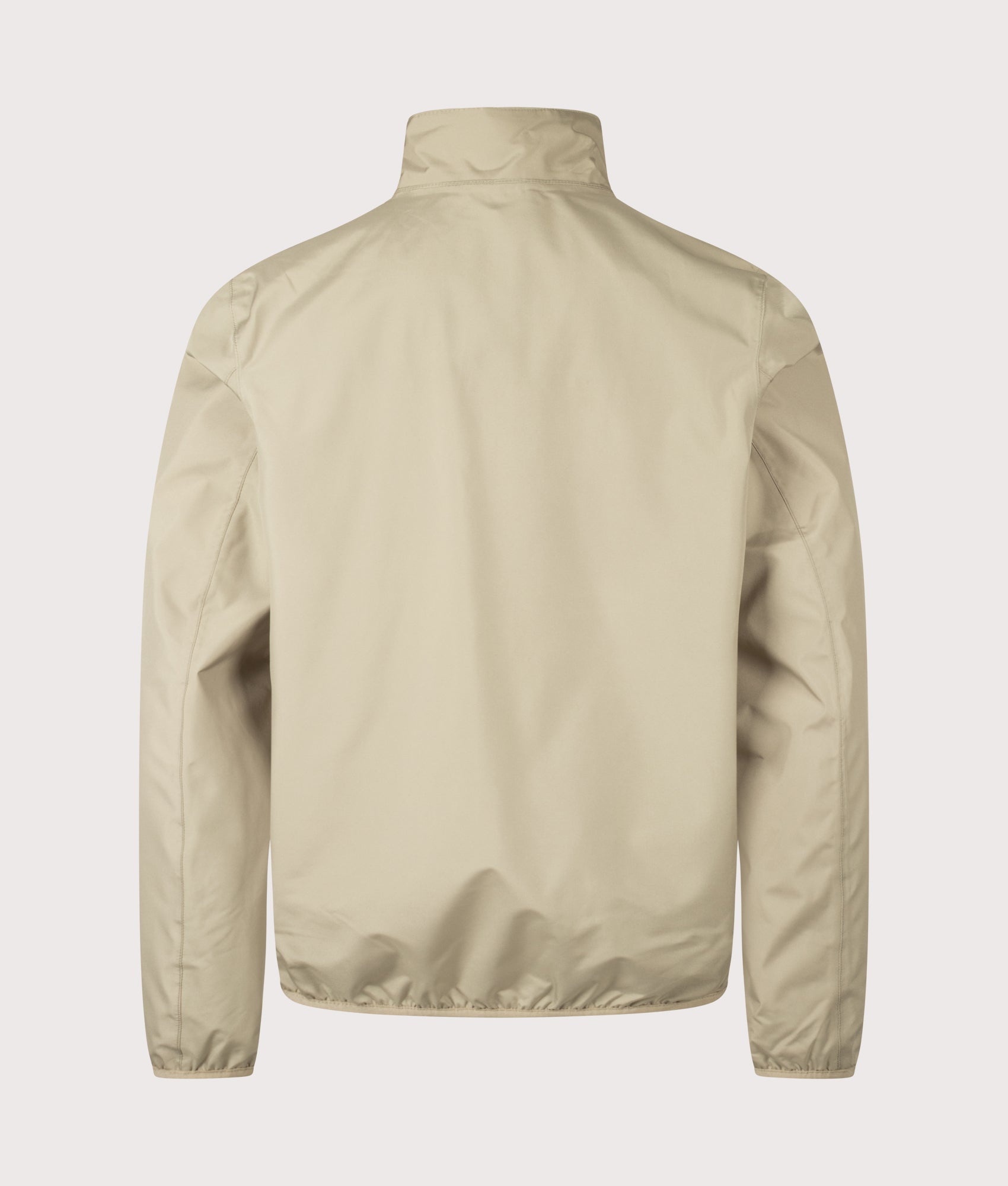 Barbour Korbel Waterproof Jacket in Washed Stone at EQVVS Menswear. Back shot.