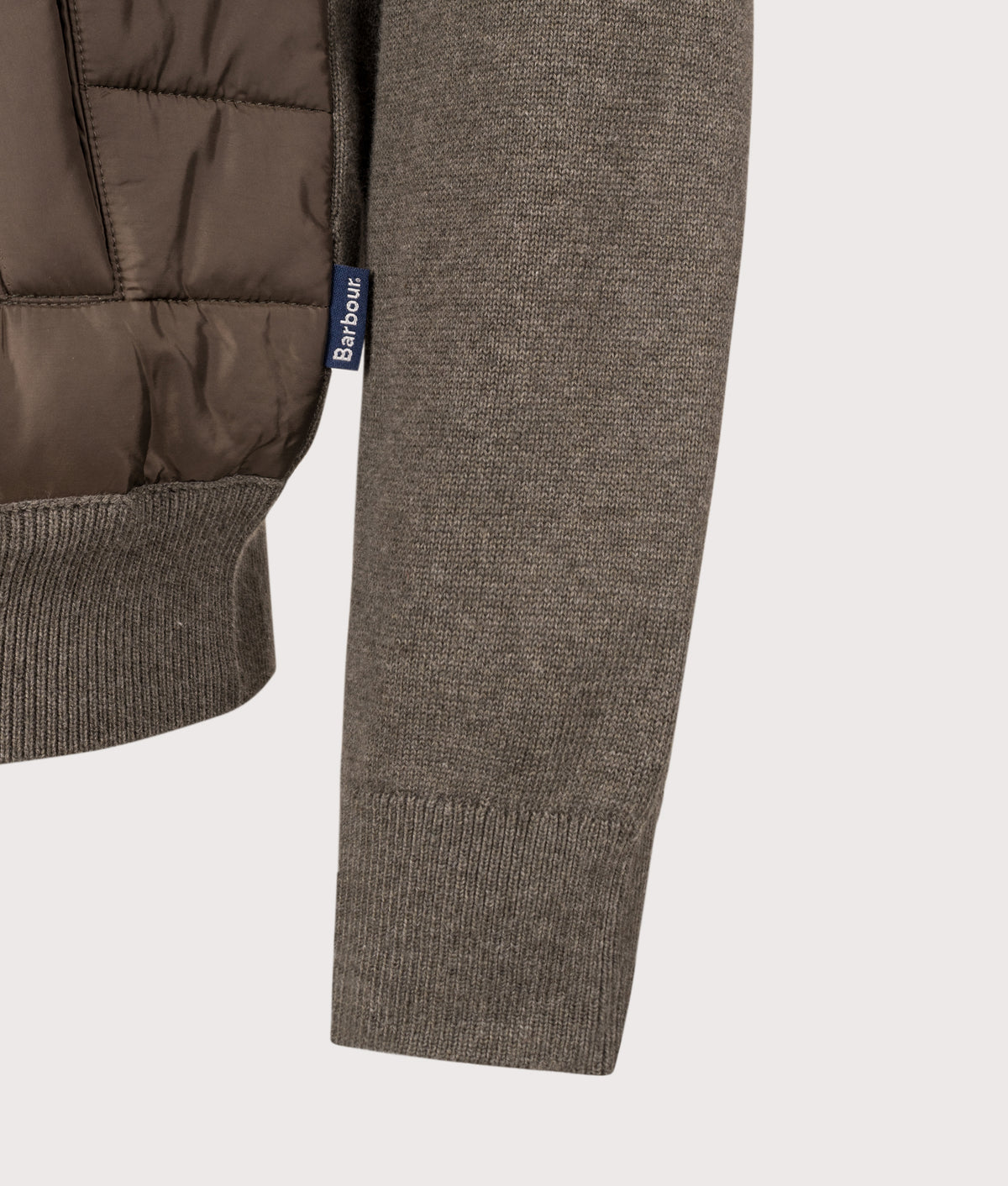 Barbour Lifestyle Tailored Fit Carn Baffle Zip Through Jumper in Olive at EQVVS Menswear. Detail shot.