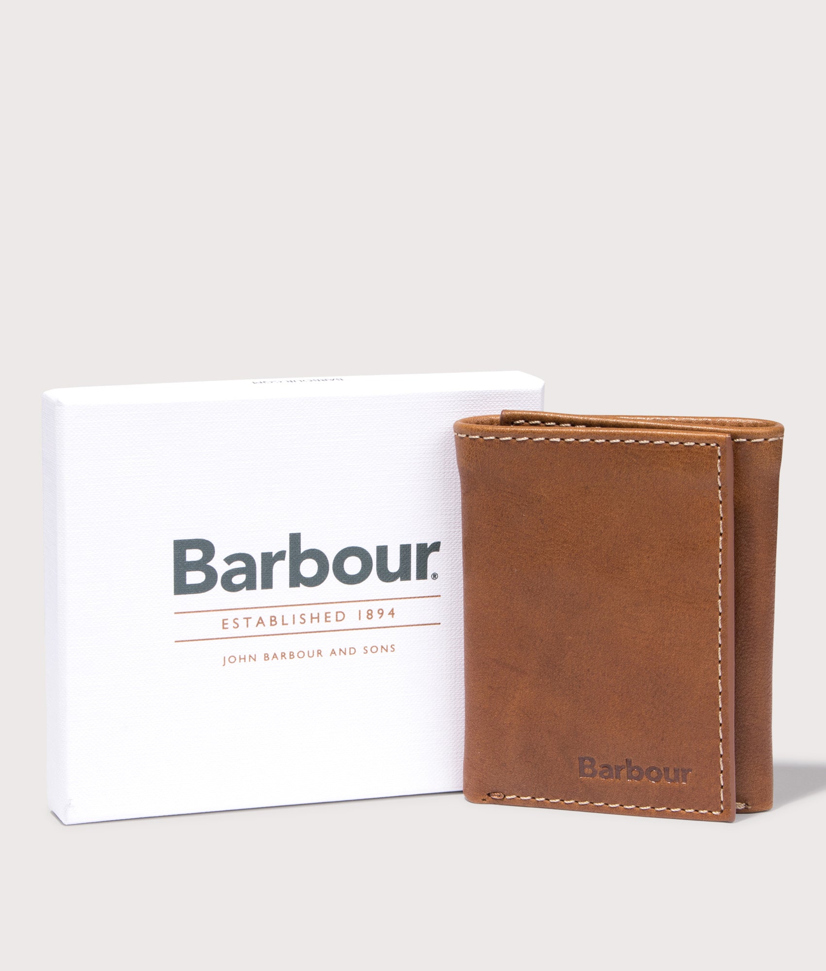 Bywell Leather Bi Fold Wallet by Barbour in Heritage Brown. Shot by EQVVS. Front shot.