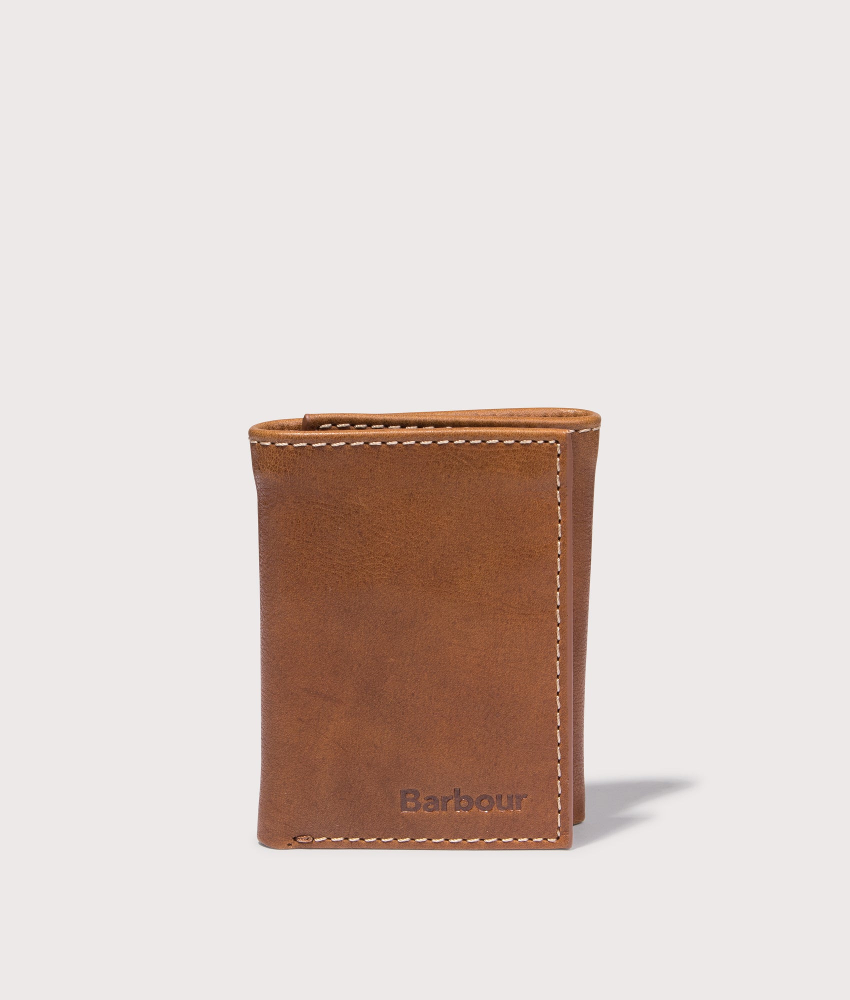 Bywell Leather Bi Fold Wallet by Barbour in Heritage Brown. Shot by EQVVS. Front shot II.