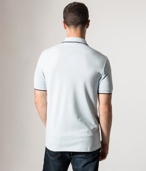 Fred Perry Twin Tipped Polo Shirt in Light Ice/Silky Peach/Tennis Blue at EQVVS Menswear. Model back shot.