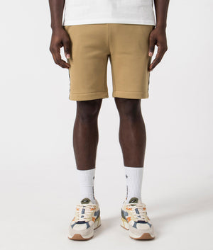 Fred Perry Taped Sweat Short in Warm Stone/Oatmeal with side taping detail.  Front angle shot at EQVVS.