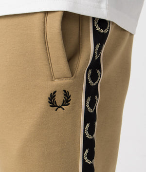 Fred Perry Taped Sweat Short in Warm Stone/Oatmeal with side taping detail. Detail shot at EQVVS.