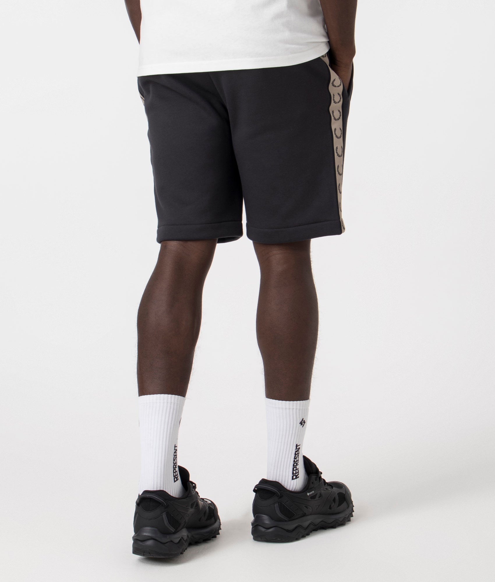 Fred Perry Taped Sweat Short in Anchor Grey/Black with side taping detail. Back angle shot at EQVVS.