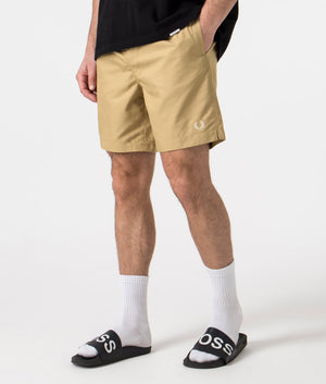 Fred Perry Classic Swim Shorts in Warm Stone Beige Angle Shot at EQVVS