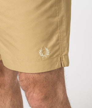 Fred Perry Classic Swim Shorts in Warm Stone Beige Detail Shot at EQVVS