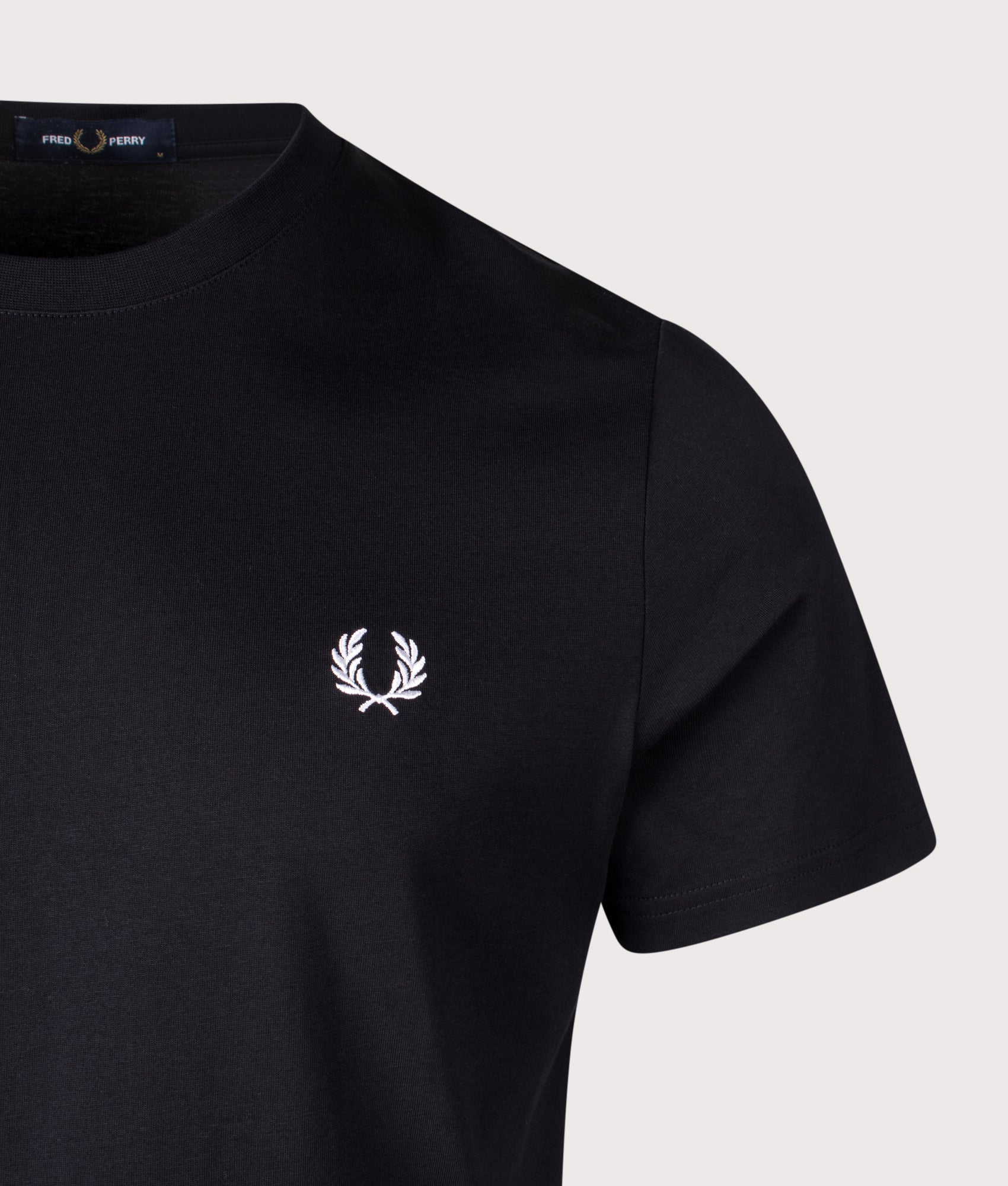 Fred Perry Rear Powder Laurel Graphic T-Shirt in Black, 100% Cotton in Black. Close-up shot. 