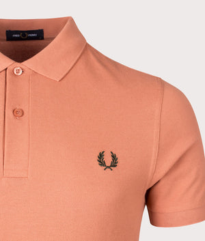 Plain M6000 Polo Shirt in Light Rust/Night Green by Fred Perry. EQVVS Detail Shot.