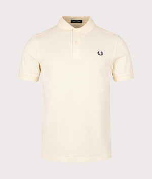 Plain Fred Perry Polo Shirt in Ice Cream and French Navy. EQVVS Front Angle Shot.