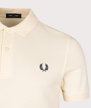 Plain Fred Perry Polo Shirt in Ice Cream and French Navy. EQVVS Detail Shot.