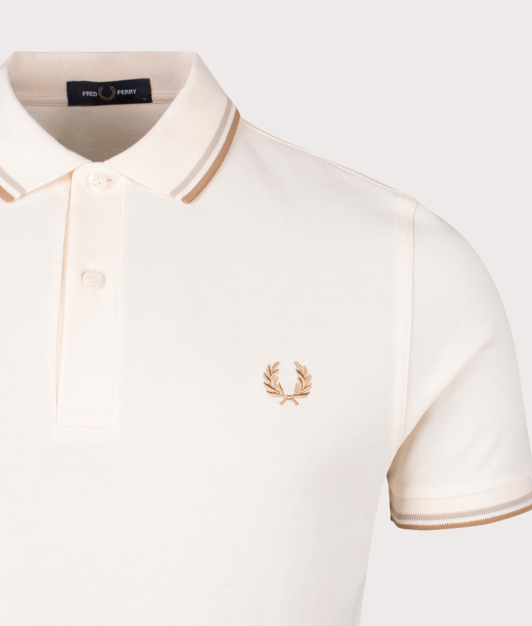 Twin Tipped Fred Perry Polo Shirt in Ecru. EQVVS Detail Shot.