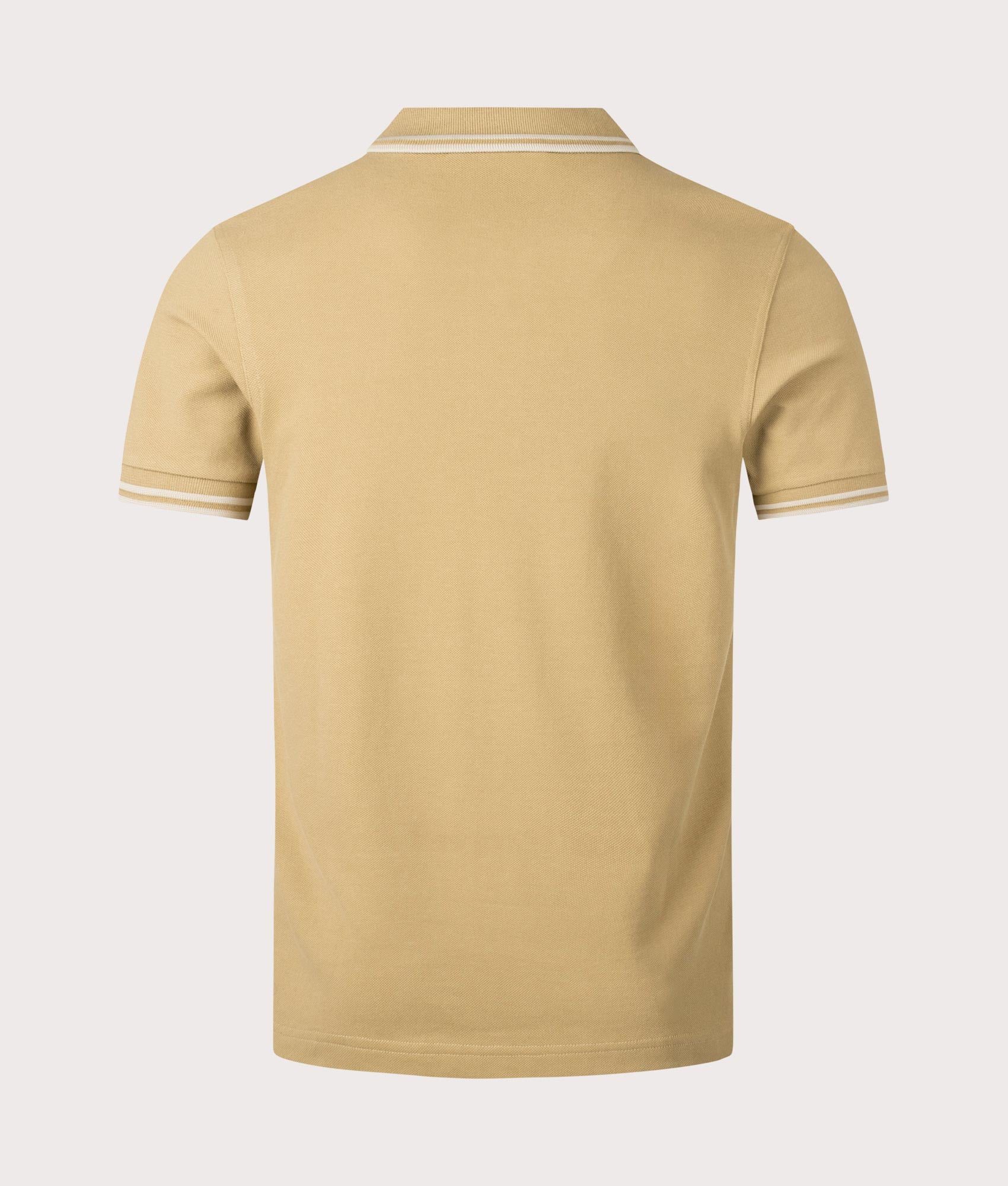 Twin Tipped Fred Perry Polo Shirt in Warm Stone and Oatmeal beige by Fred Perry. EQVVS Back Angle Shot.