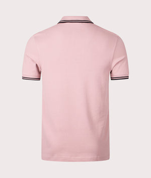 Twin Tipped Fred Perry Polo Shirt in Dusty Rose Pink. EQVVS Back Angle Shot.