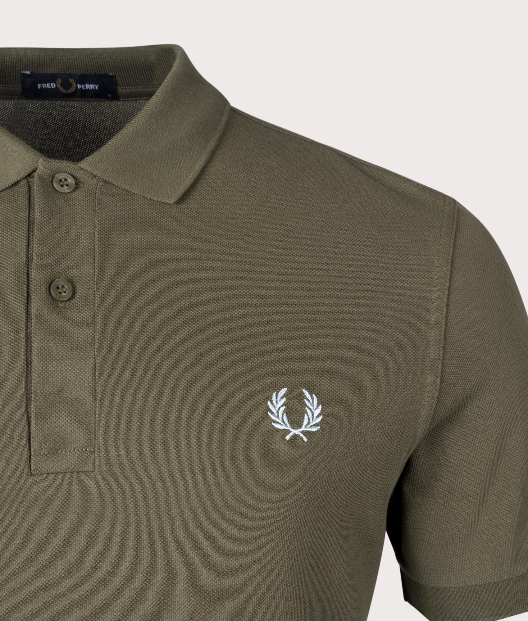 Plain Fred Perry Shirt in Uniform Green by Fred Perry. EQVVS Detail Shot.