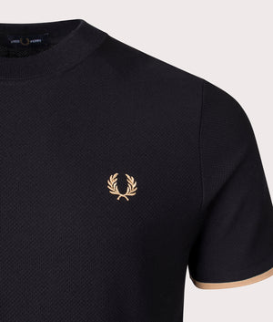 Tipped Cuff Pique T-Shirt in Black by Fred Perry. EQVVS Detail Angle Shot.