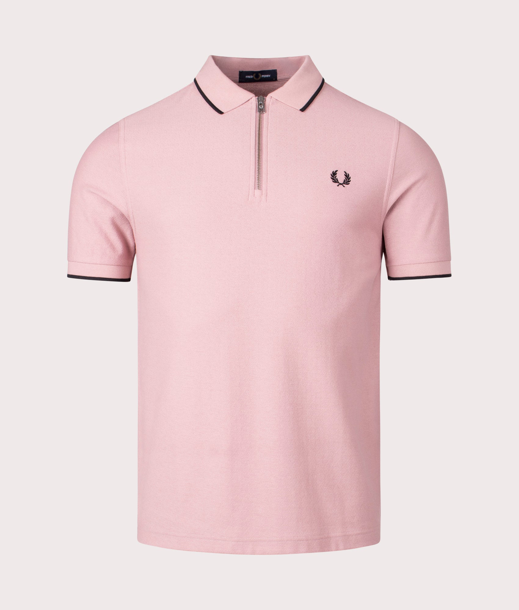 Crepe Pique Zip Neck Polo Shirt in Dusty Rose Pink by Fred Perry. EQVVS Front Angle Shot.