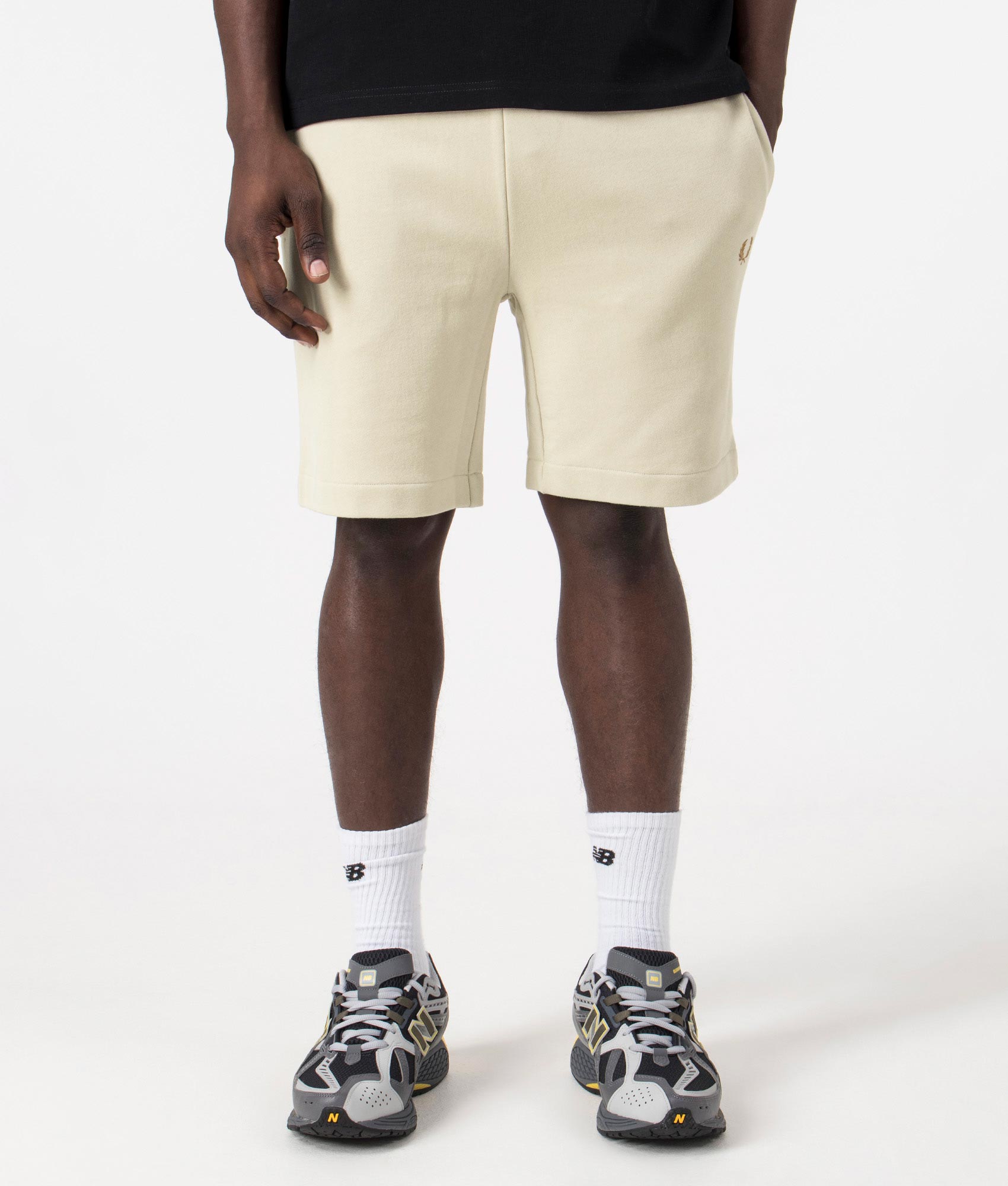 Peached Sweat Shorts in Light Oyster by Fred Perry. EQVVS Model Shot.