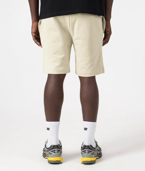 Peached Sweat Shorts in Light Oyster by Fred Perry. EQVVS Model Shot.
