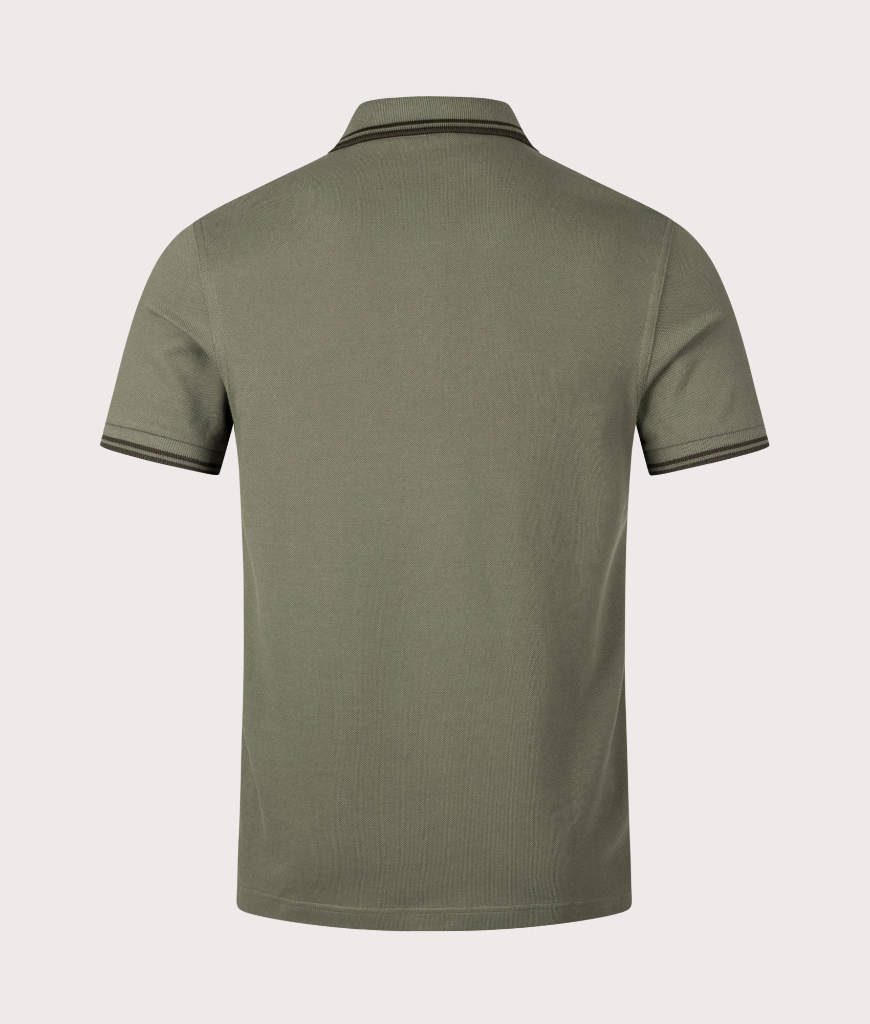 The Twin Tipped Fred Perry Polo Shirt in Laurel Wreath Green by Fred Perry. EQVVS Shot.