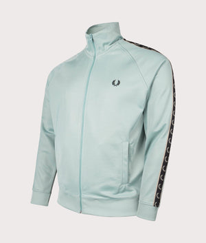 Contrast Tape Track Jacket in Silver Blue by Fred Perry. EQVVS Side Angle Shot.