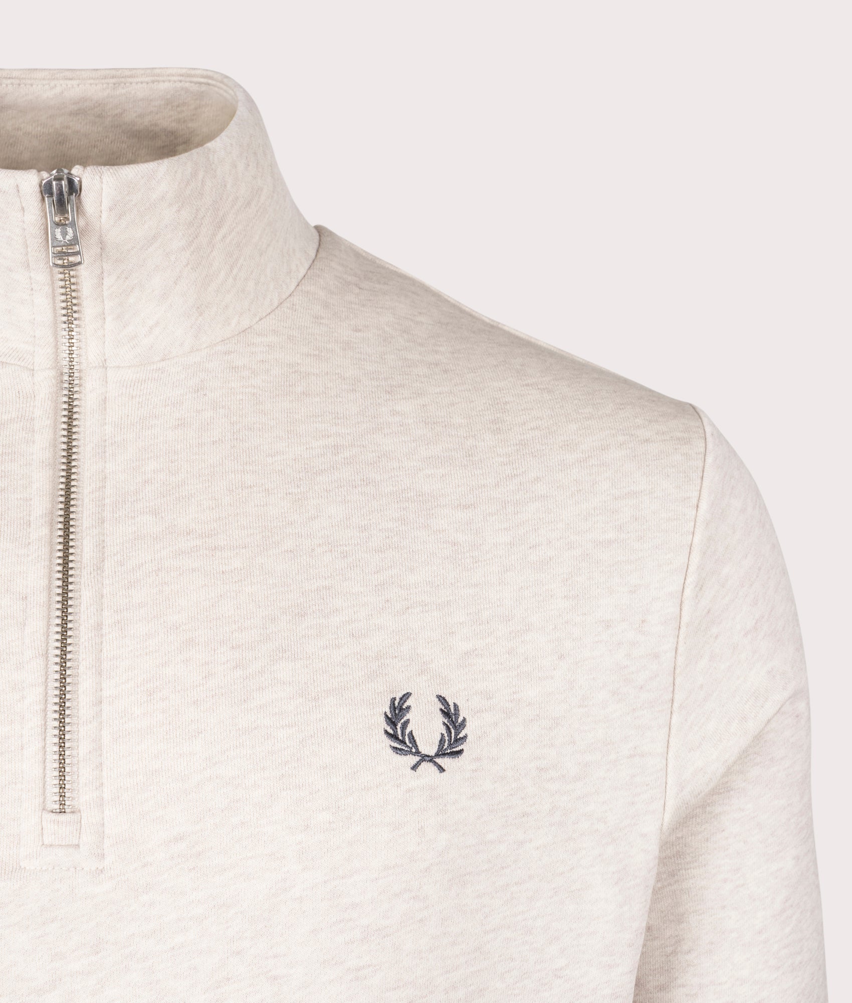 Fred Perry Quarter Zip Sweatshirt in Porridge Marl at EQVVS Menswear. Detail shot.