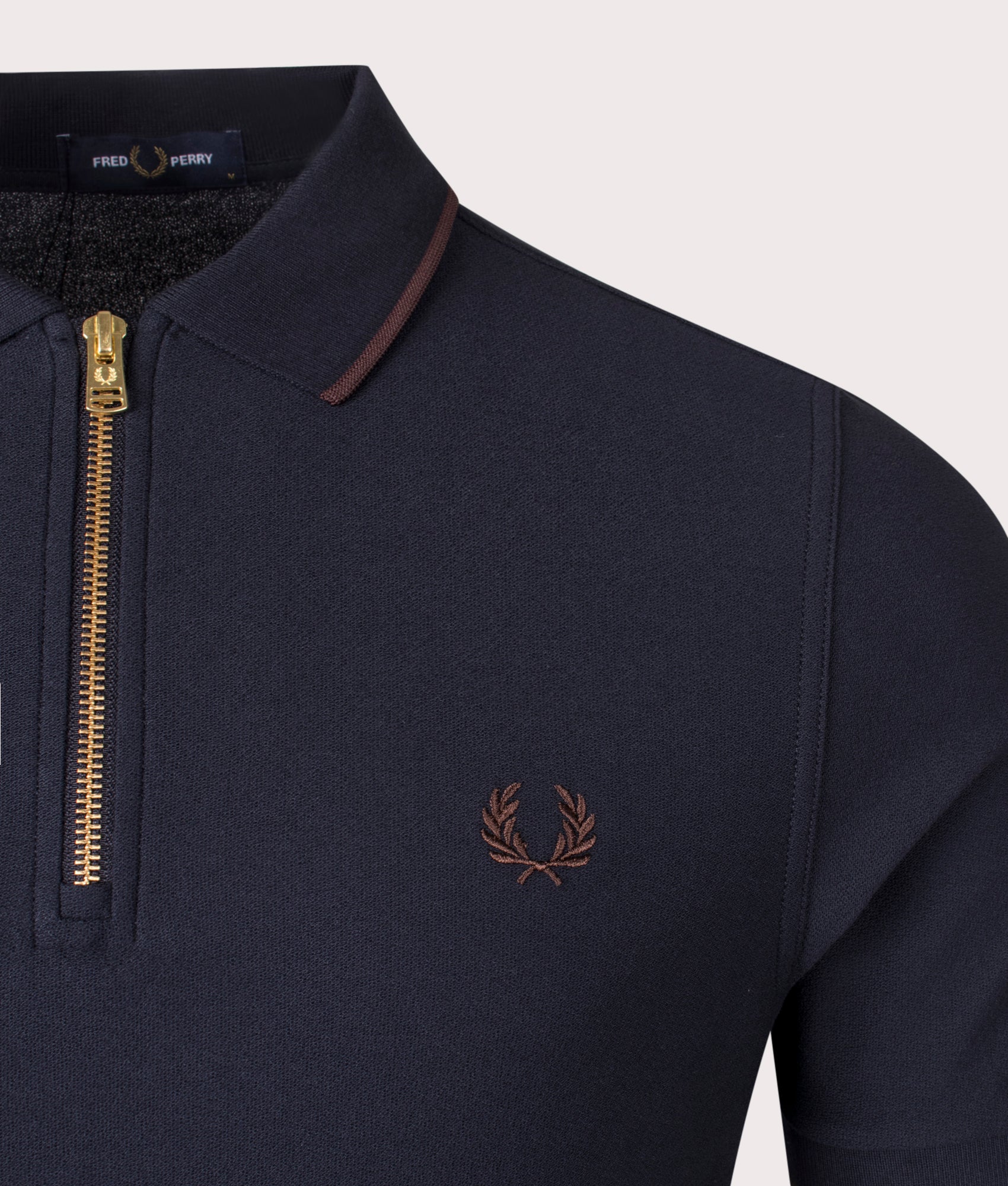 Crepe Pique Zip Neck Polo Shirt in Navy by Fred Perry. EQVVS Shot.