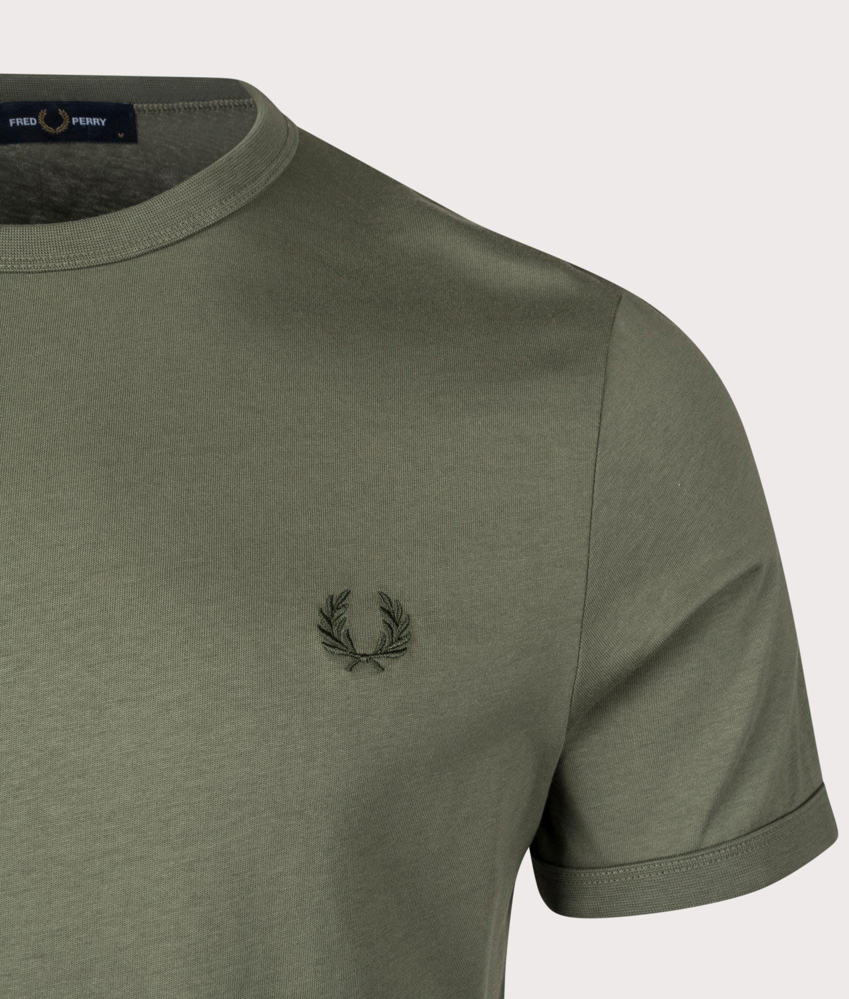 Ringer T-Shirt in Laurel Wreath Green by Fred Perry. EQVVS Shot.