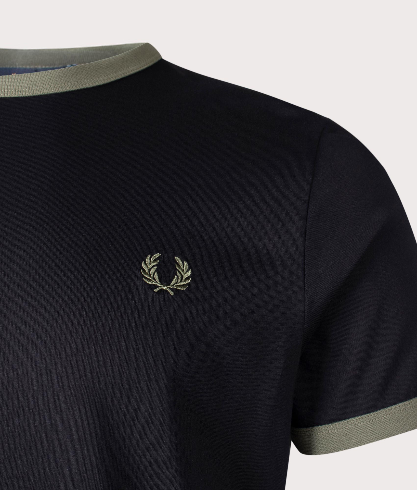 Ringer T-Shirt in Black and Laurel Wreath Green by Fred Perry. EQVVS Menswear Detail Shot. 
