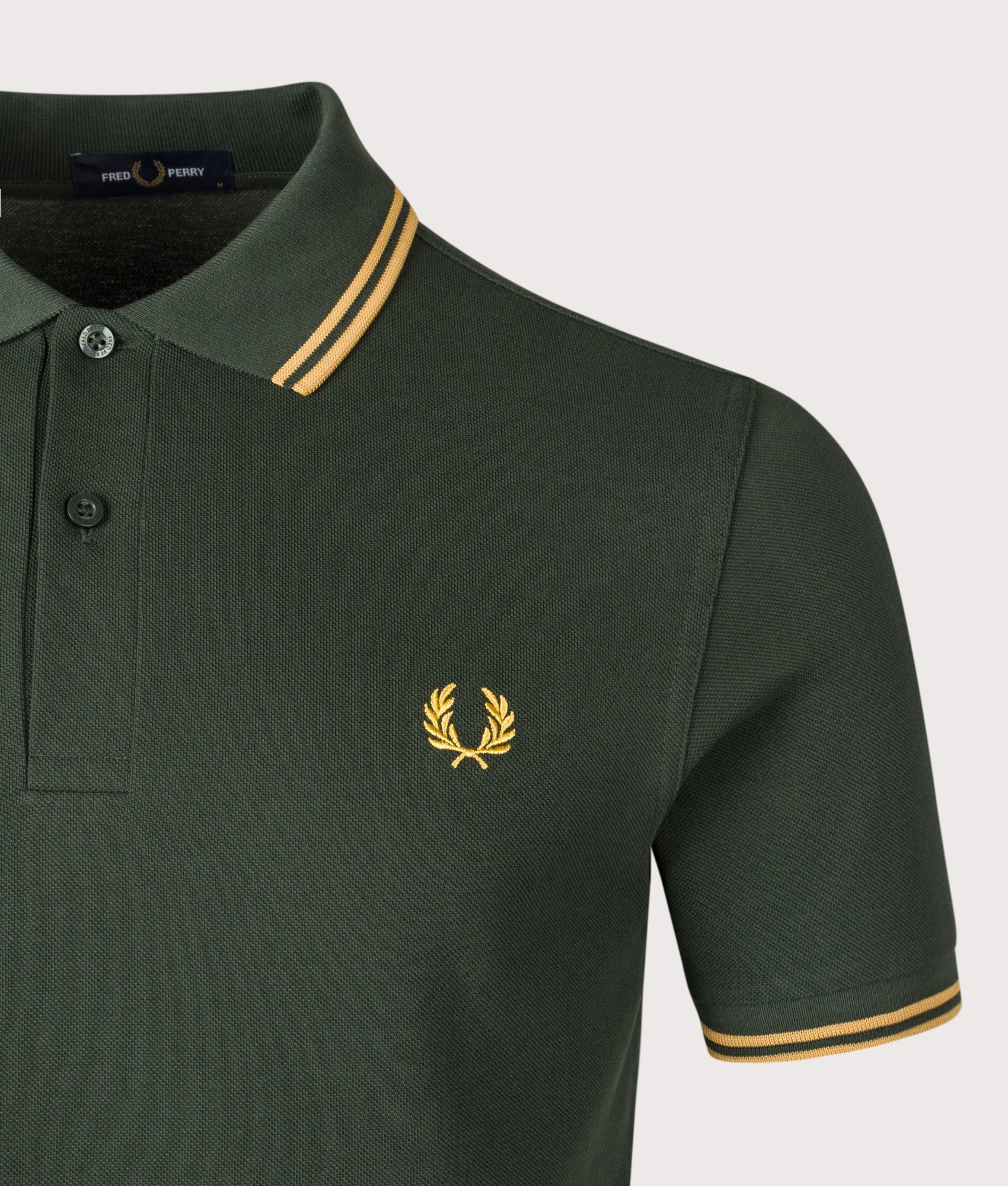 Twin Tipped Fred Perry Polo Shirt. Shot by EQVVS. Detail shot.