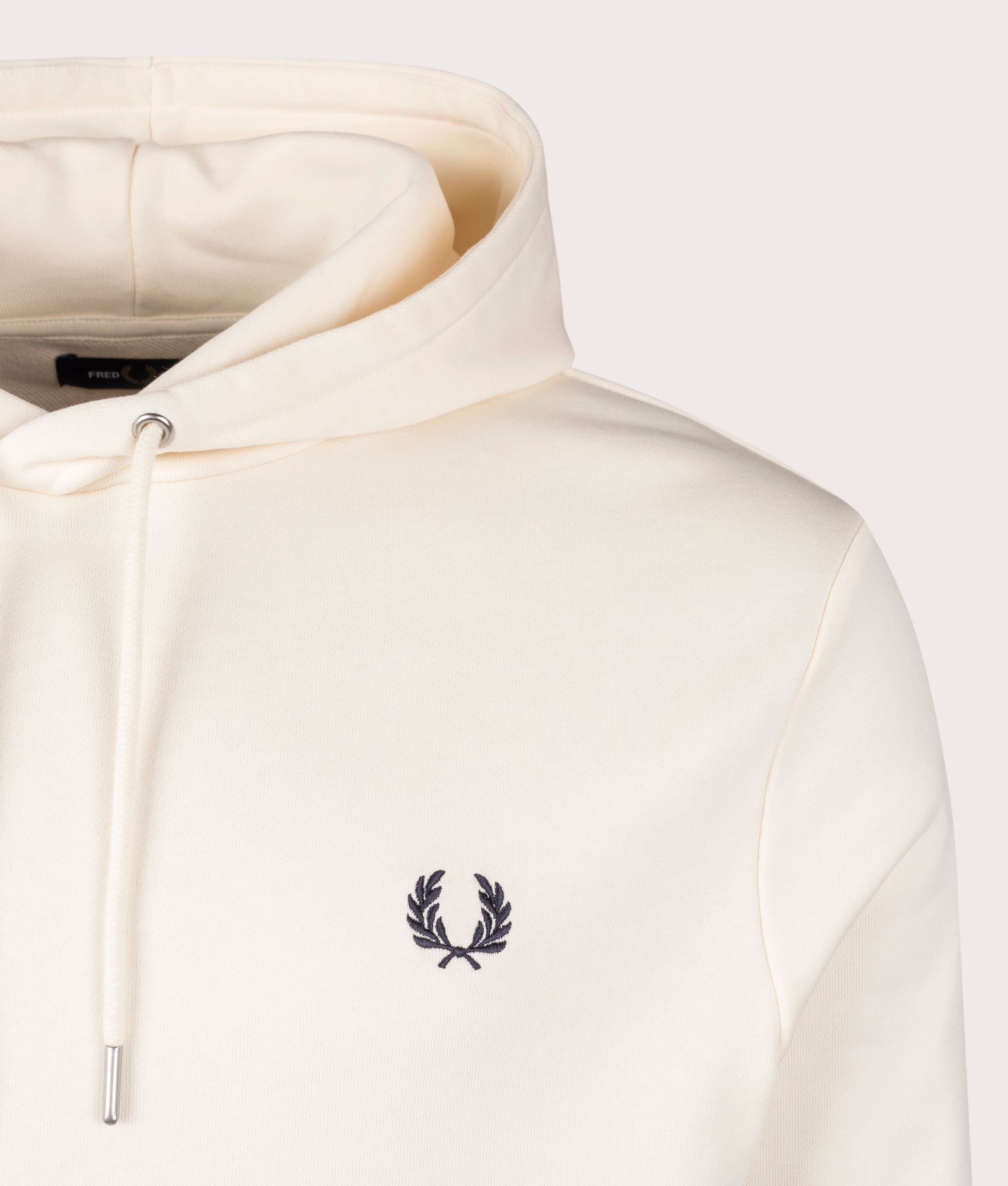 Fred Perry Twin Tipped Hoodie in Ecru at EQVVS. Detail Shot.