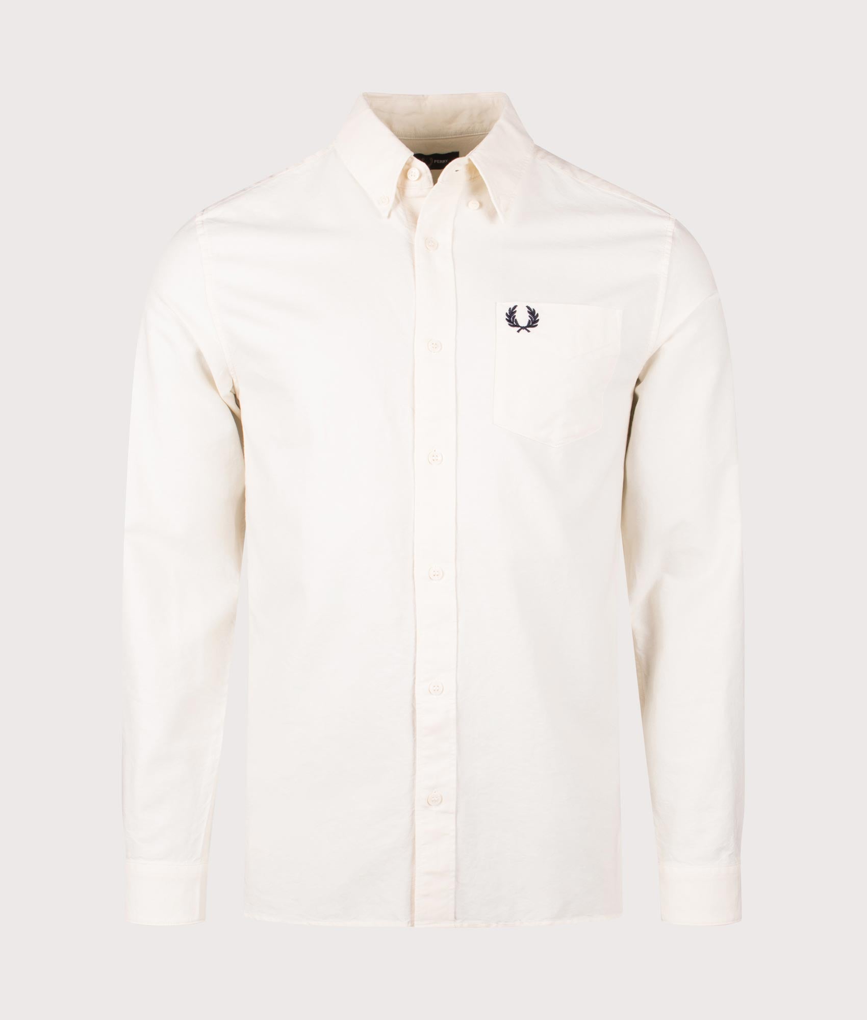 Fred Perry Oxford Shirt in Light Ecru. Shot at EQVVS. Front shot.