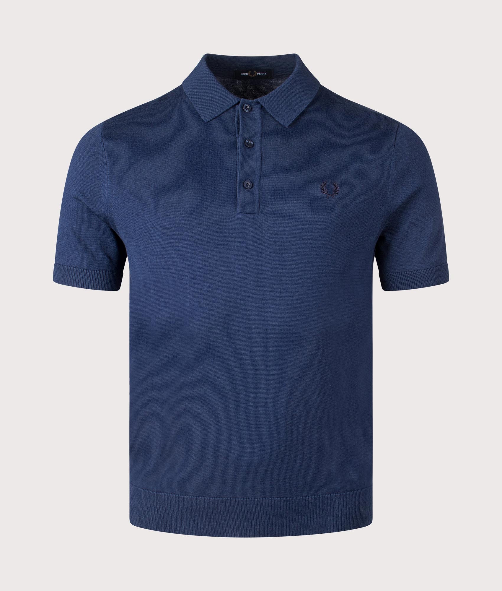 Fred Perry Cotton Polo Shirt in Tennis Blue. Shot at EQVVS. Front shot. 
