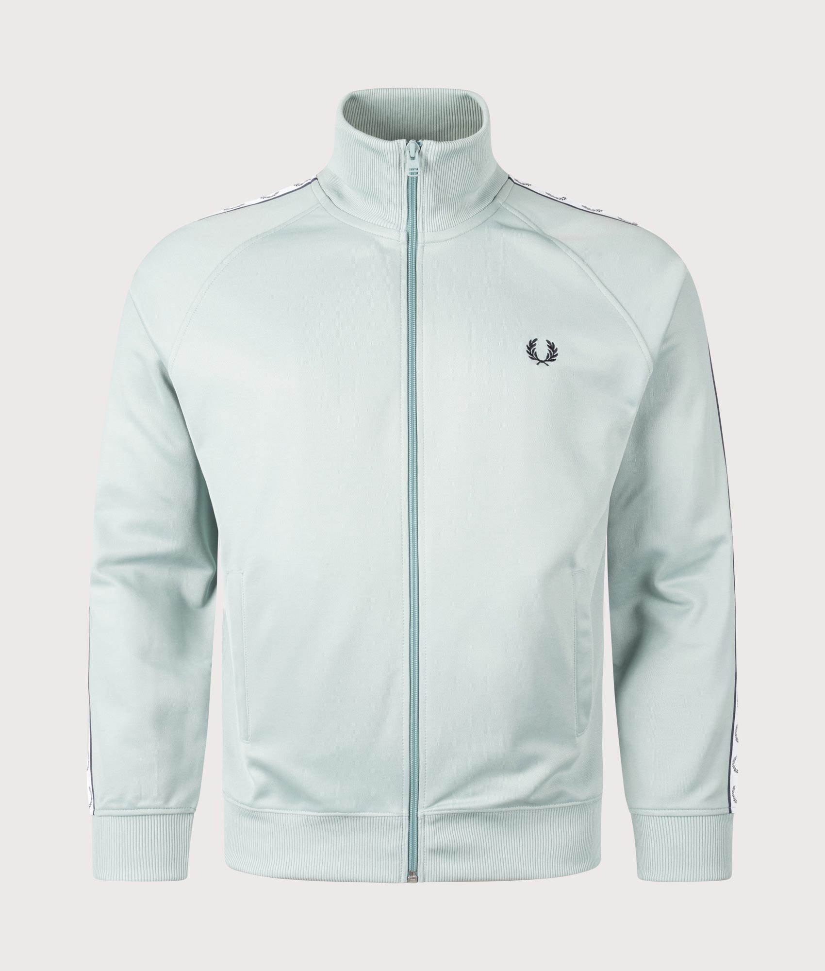 Fred Perry Taped Track Jacket in Silver Blue at EQVVS. Front shot. 