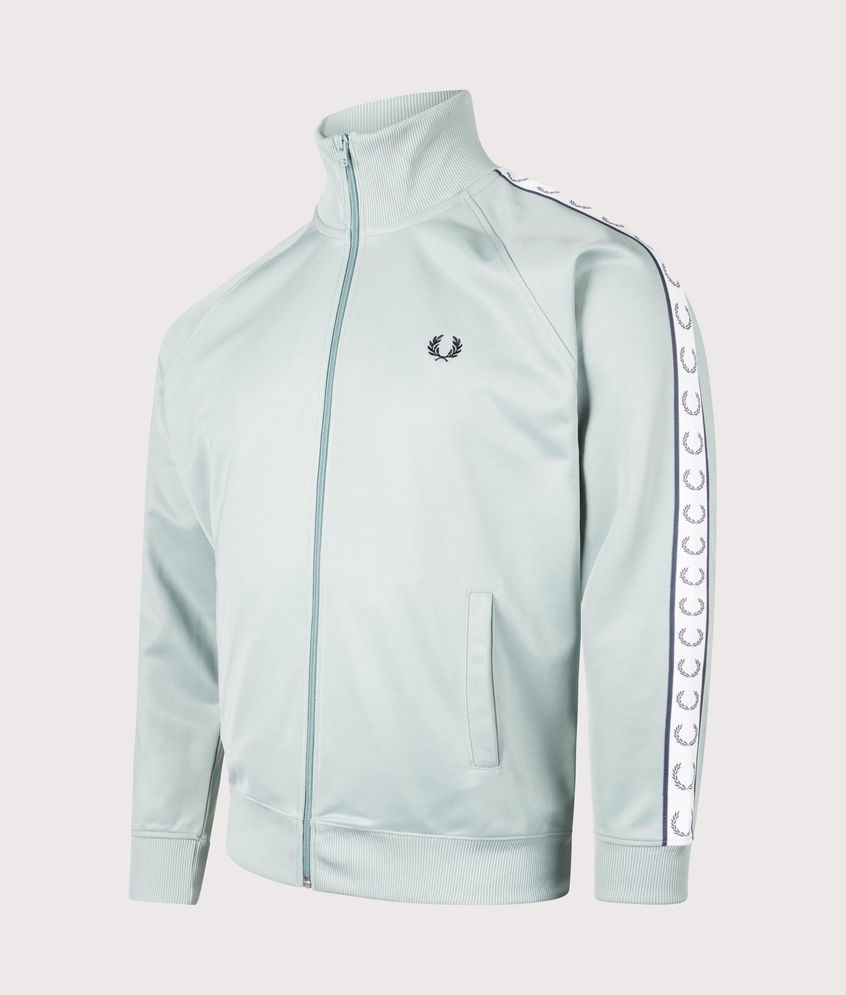 Fred Perry Taped Track Jacket in Silver Blue at EQVVS. Side shot. 