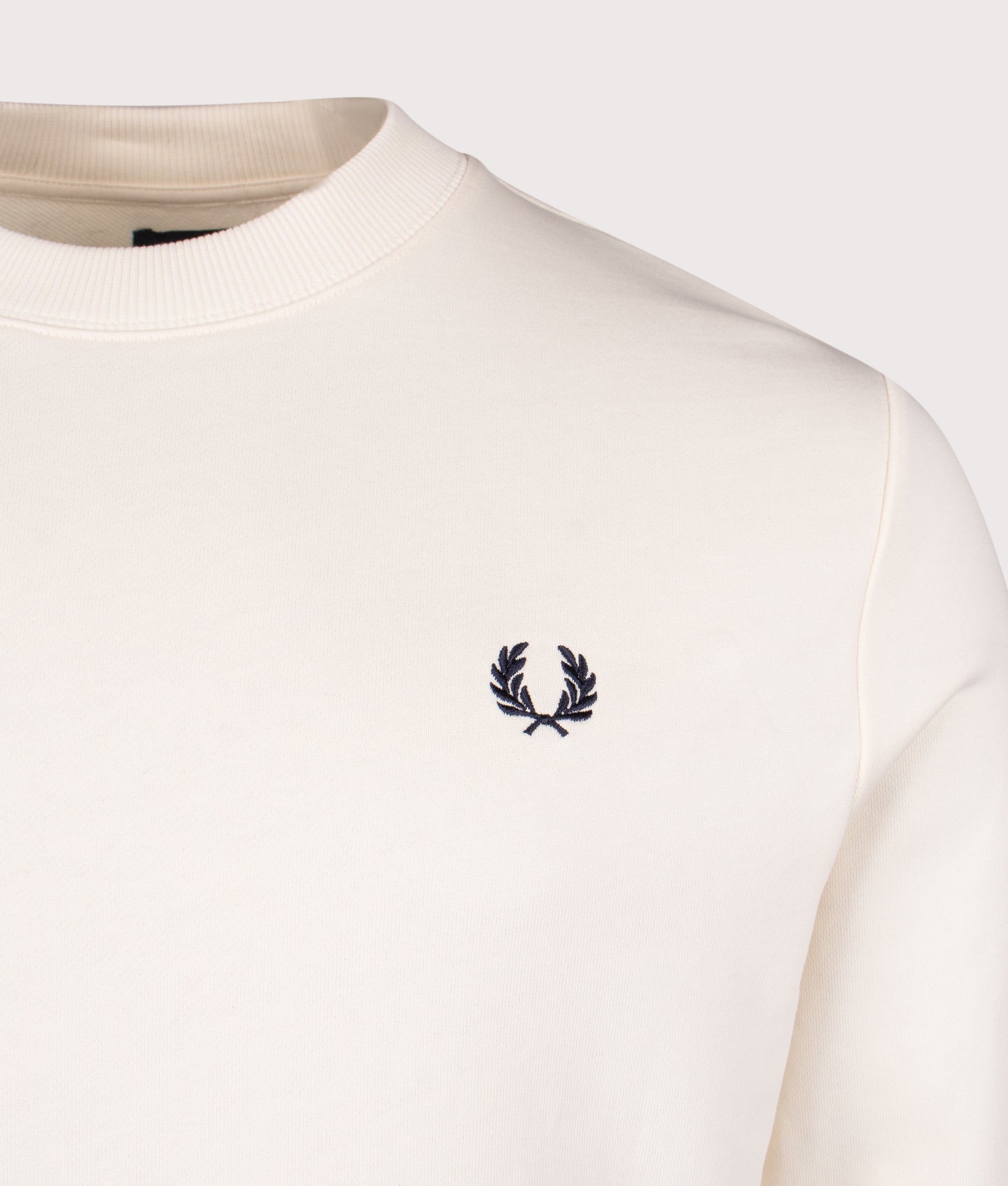 Fred Perry Crew Neck Sweatshirt in Ecru/Tennis Blue. Shot at EQVVS.  Detail shot. 