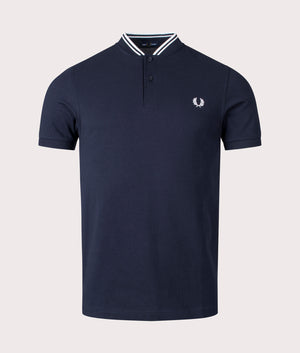 Bomber Collar Polo Shirt in navy by Fred Perry at EQVVS. Front shot