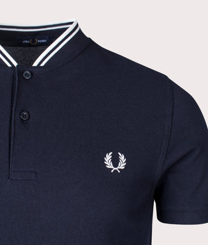 Bomber Collar Polo Shirt in navy by Fred Perry at EQVVS. detail Shot