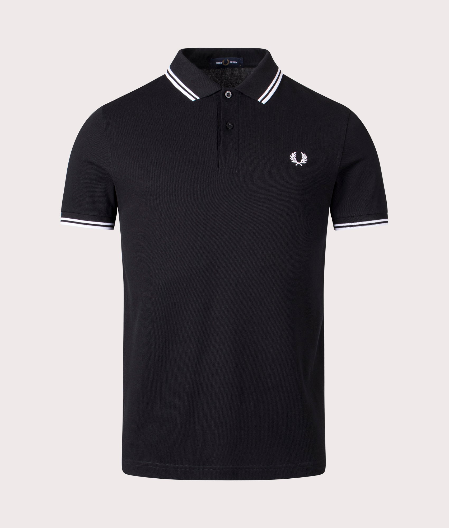 Twin Tipped Fred Perry Polo Shirt in Black at EQVVS Menswear. Front shot.