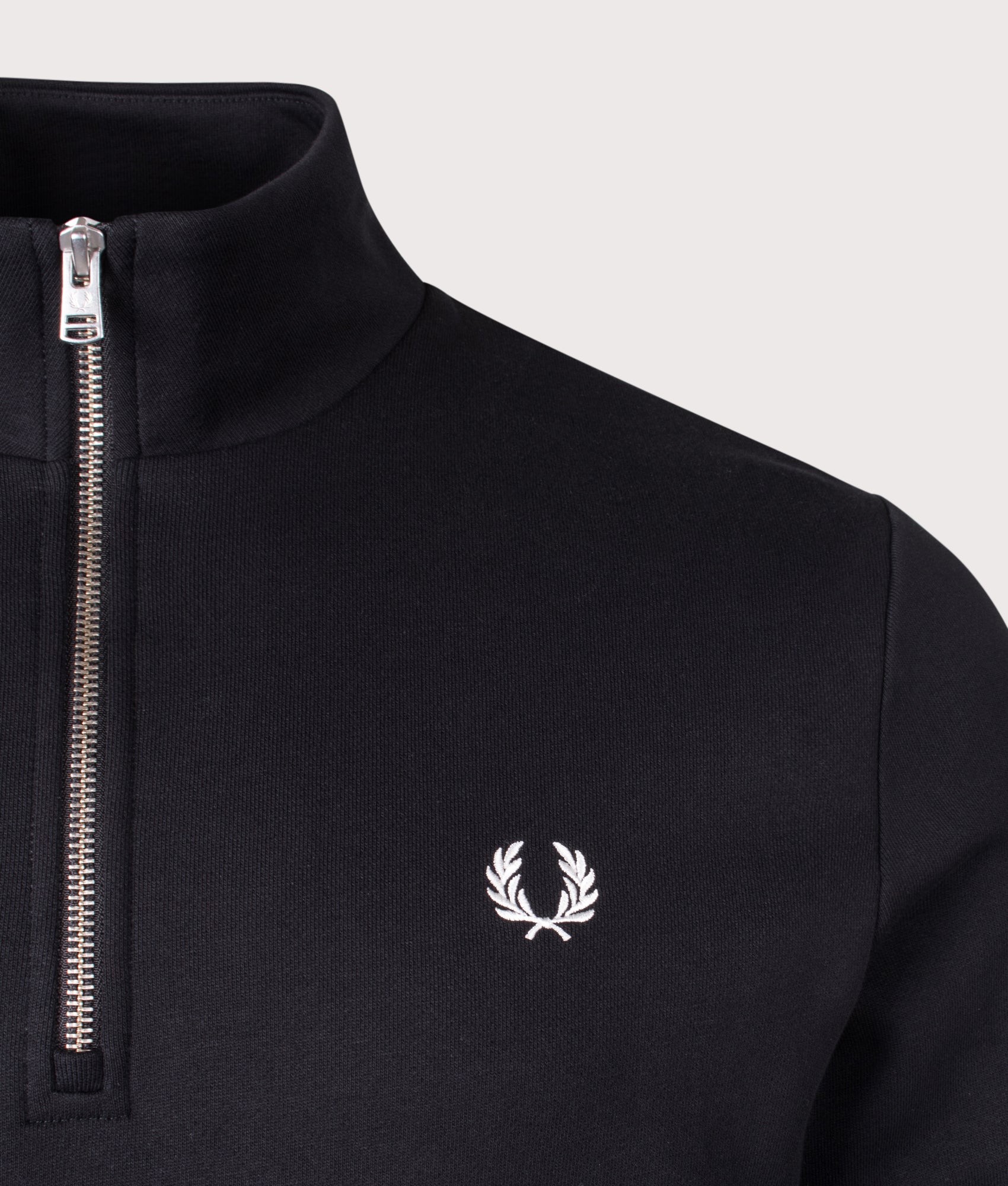 Fred Perry Quarter Zip Sweatshirt in Black at EQVVS Menswear. Detail shot. 