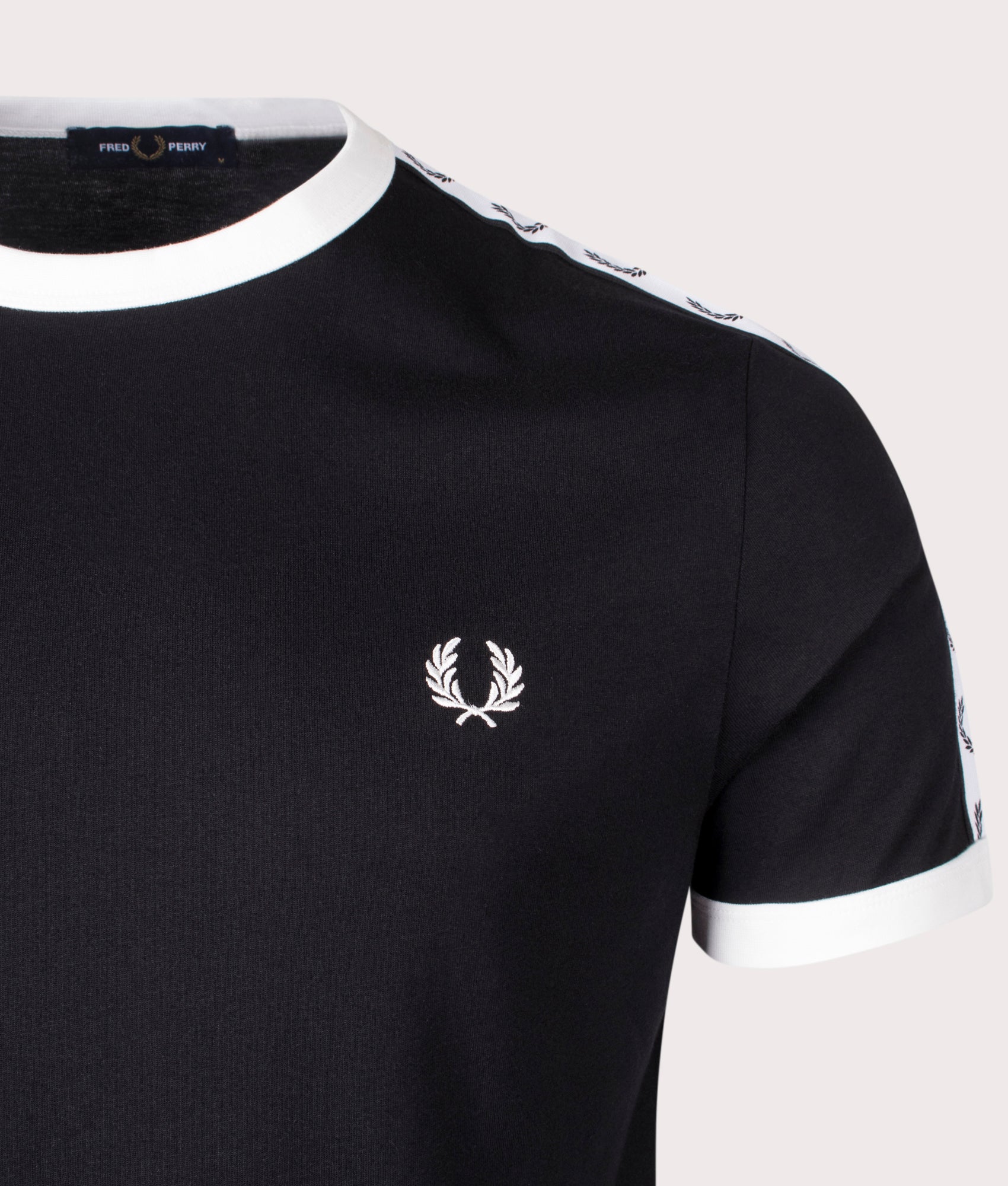 Fred Perry Taped Ringer T-Shirt in Black at EQVVS. Angle Shot.