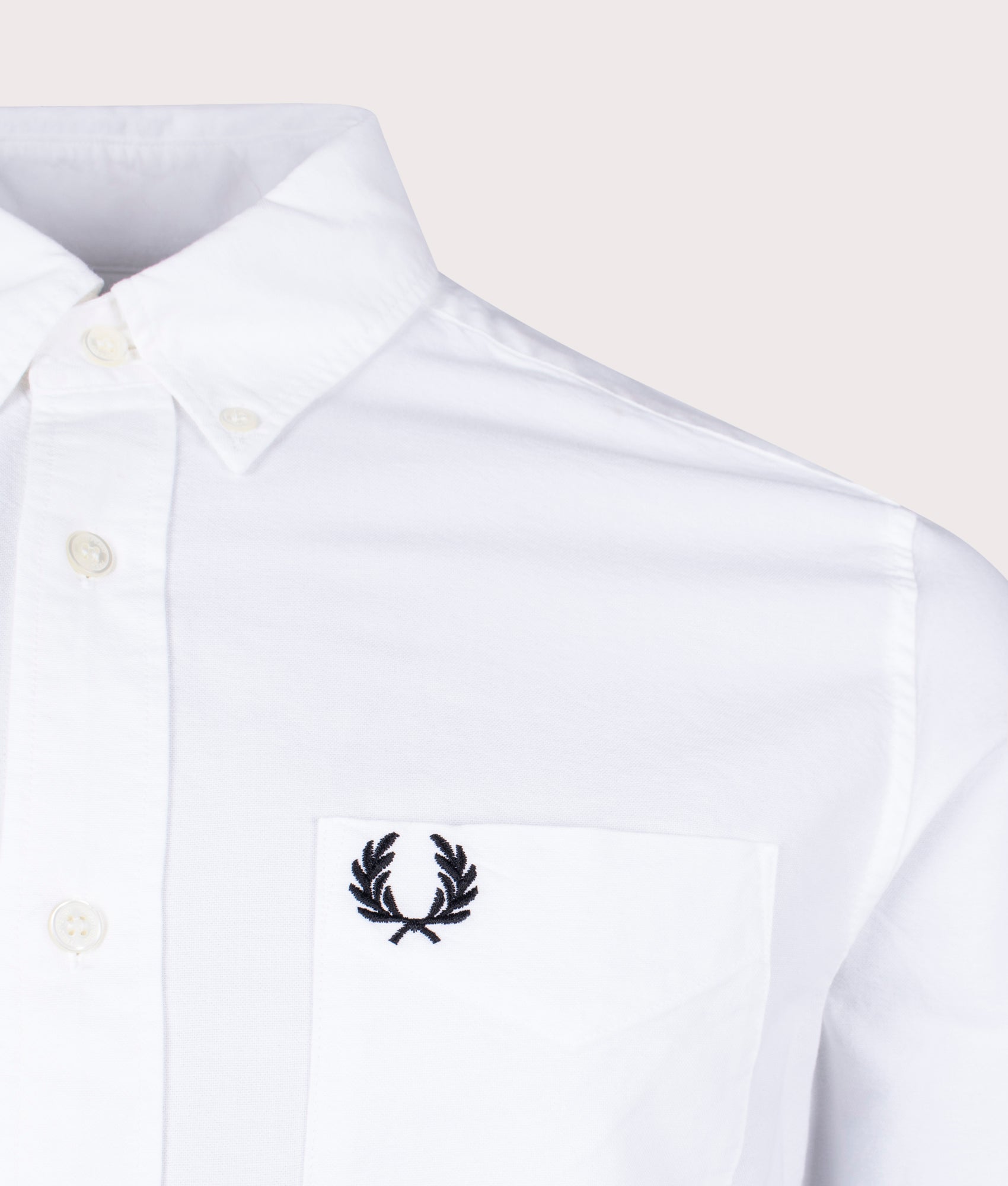 Fred Perry Oxford Shirt in White at EQVVS Menswear. Detail shot.