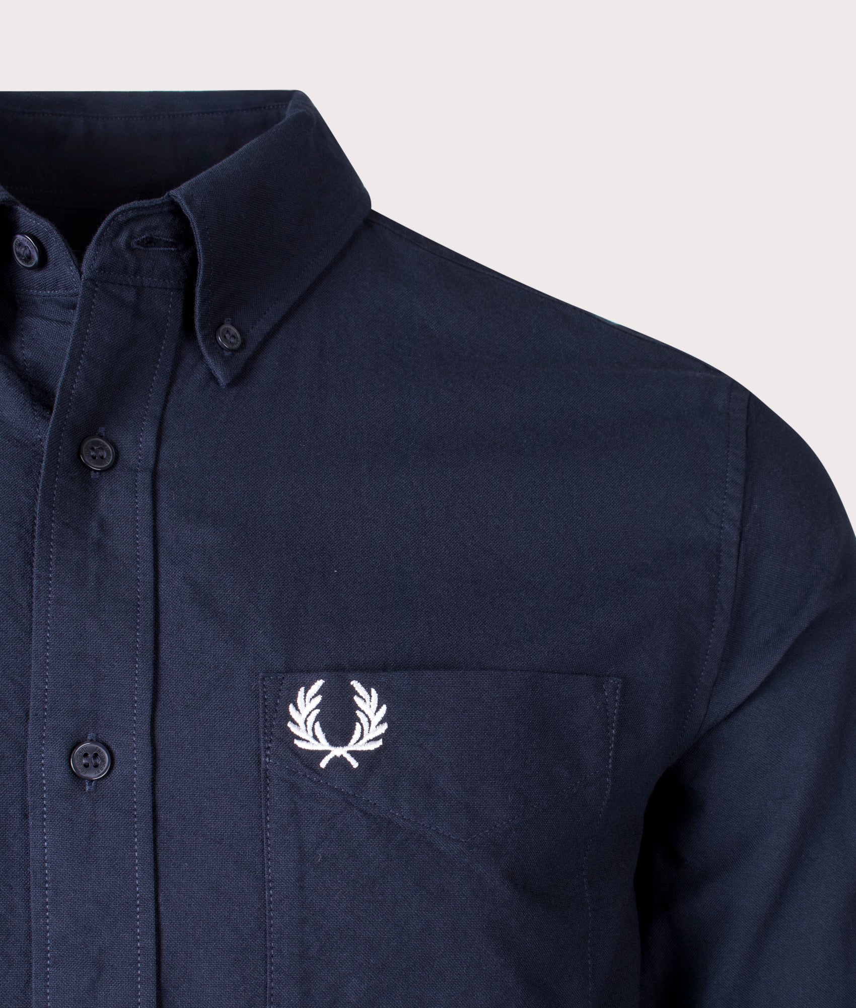 Fred Perry Oxford shirt in Navy at EQVVS Menswear. Detail shot.