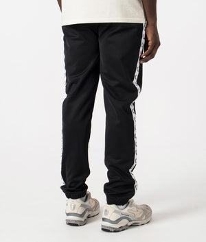 Track Pants in Black by Fred Perry. EQVVS Back Angle Shot.