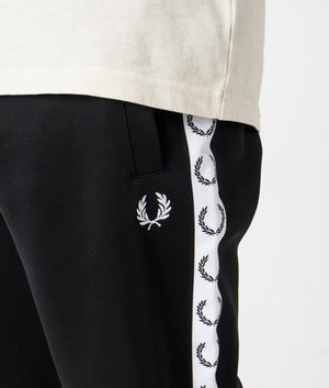 Track Pants in Black by Fred Perry. EQVVS Detail Shot.