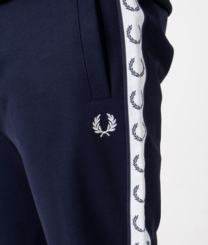 Track Pants in Carbon Blue by Fred Perry. EQVVS Detail Shot.