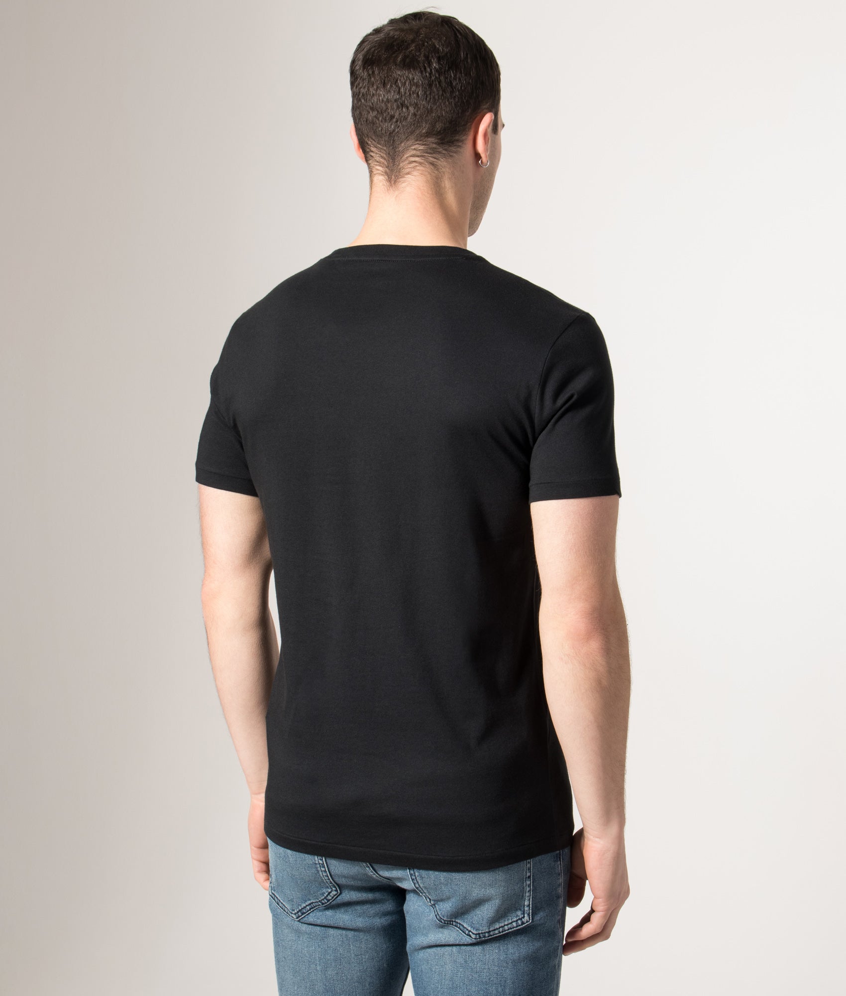 Polo Ralph Lauren Custom Slim Fit T-Shirt in RL Black at EQVVS Menswear. Angled model back shot.