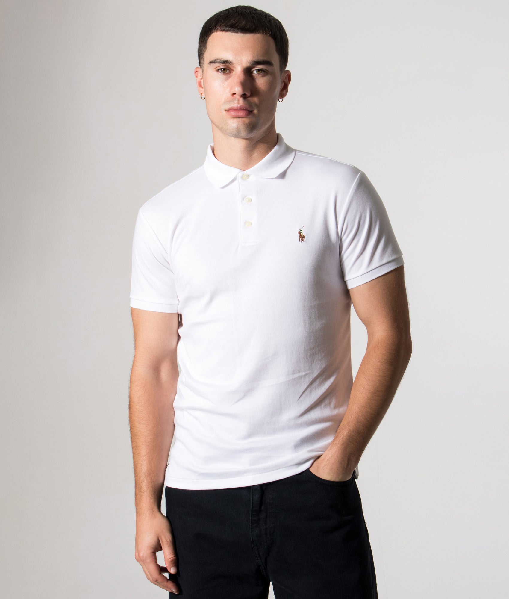 Polo Ralph Lauren Slim Fit Soft Touch Pima Polo Shirt in core 001 White at EQVVS Menswear. Model Front shot. 