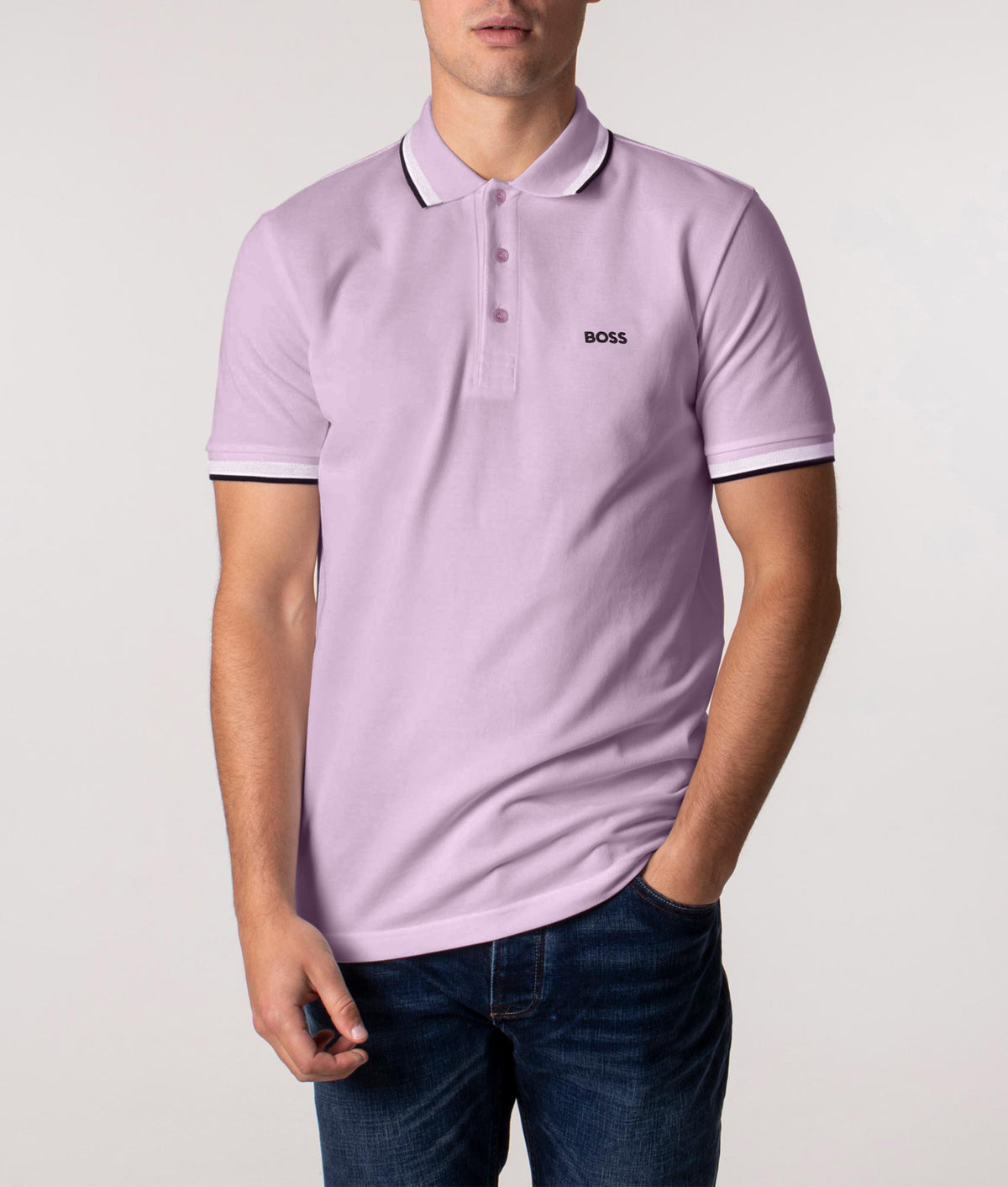 BOSS Paddy Polo shirt in Light/Pastel Purple at EQVVS Menswear. Front model shot.