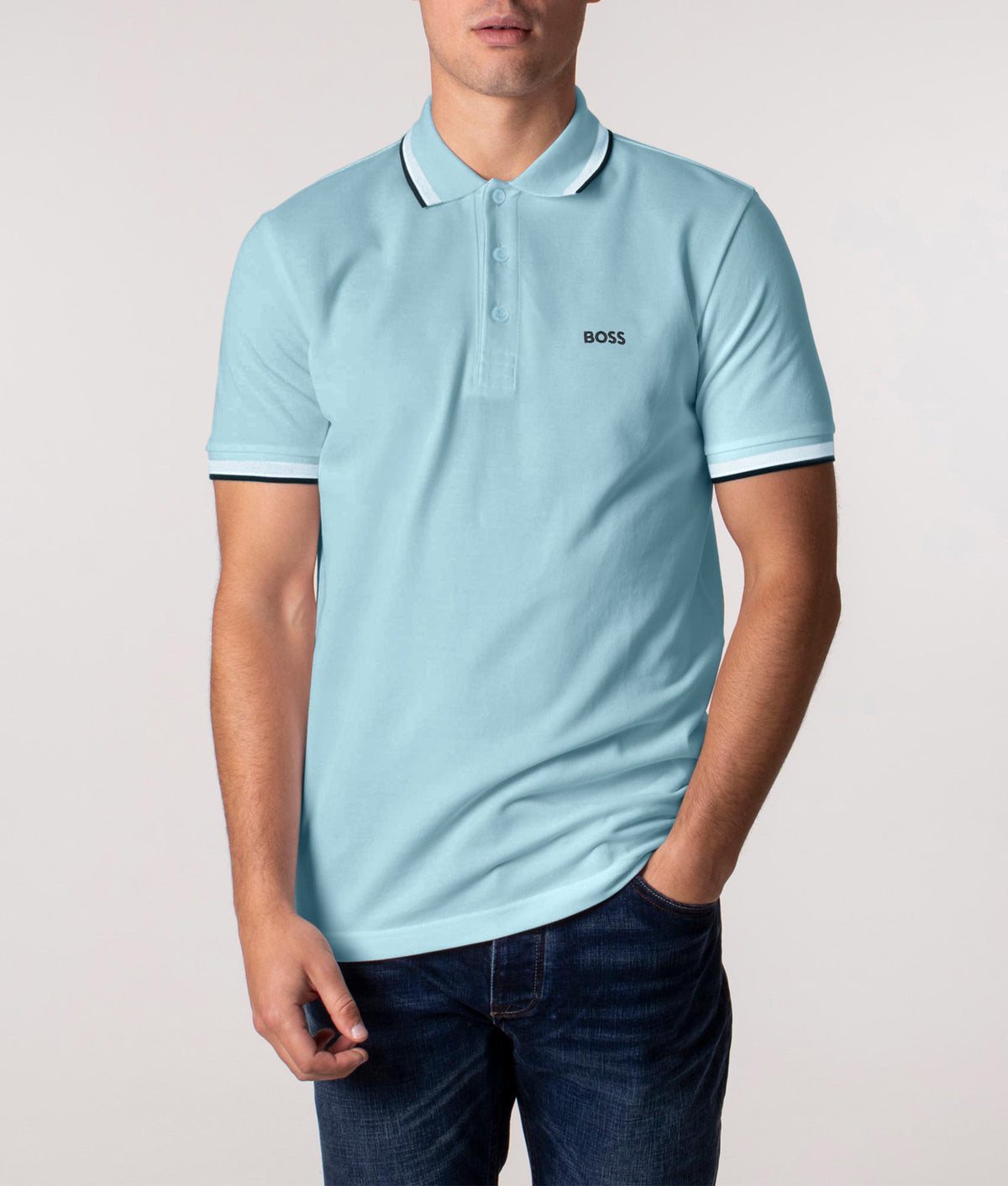 BOSS Regular Fit Paddy Polo Shirt in Open Blue at EQVVS Menswear. Front model shot.