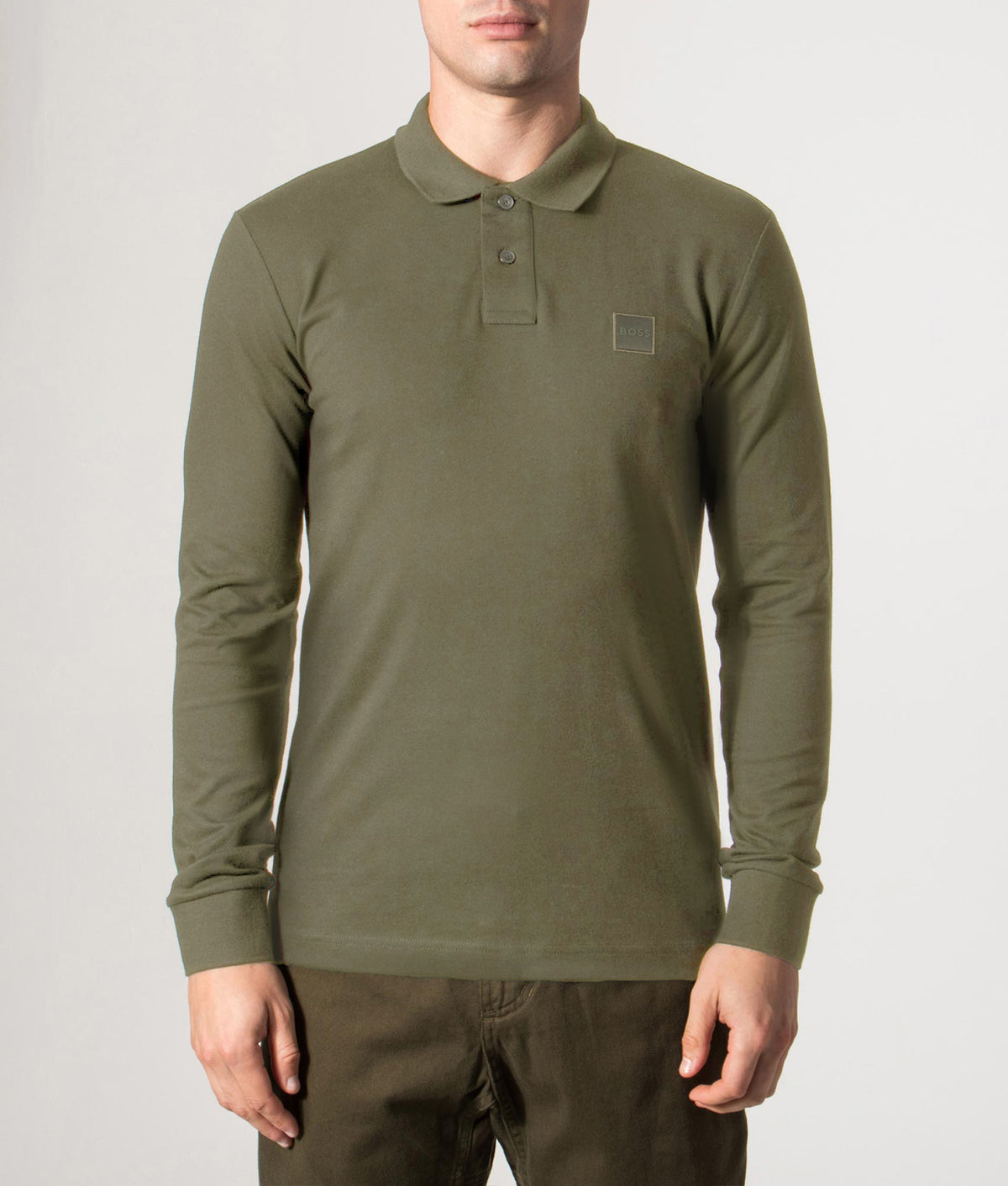 BOSS Slim Fit Passerby Long Sleeve Polo Shirt in Bright Green at EQVVS Menswear. Front model shot.